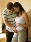признаки беременности поясница